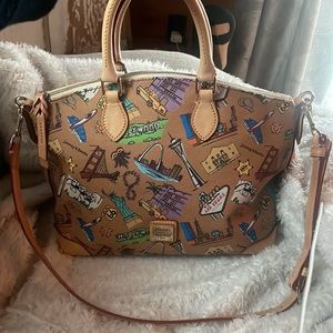 Dooney & Bourke Special Edition traveling bag with Crossbody Straps EUC